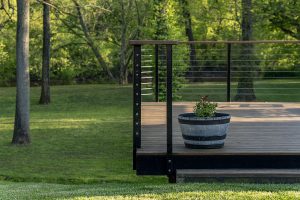 A side view deck with Equity Building Group's Railings