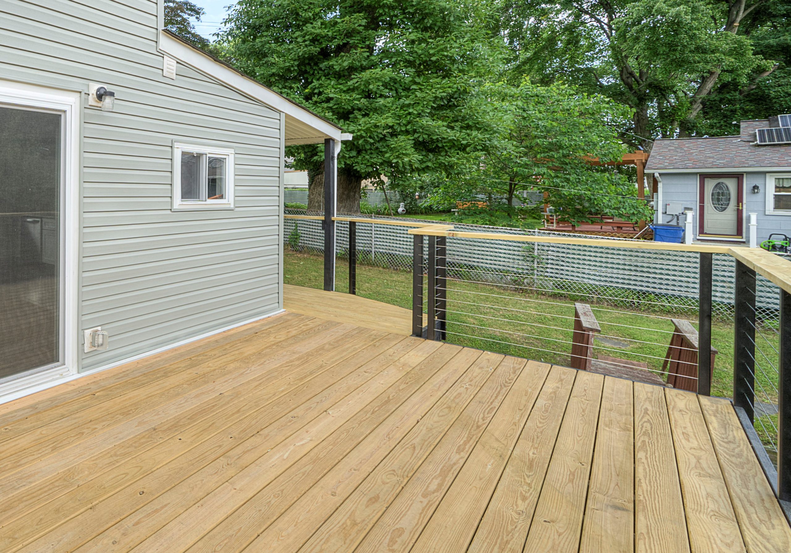 A view of a deck with Equity Building Group's Railings